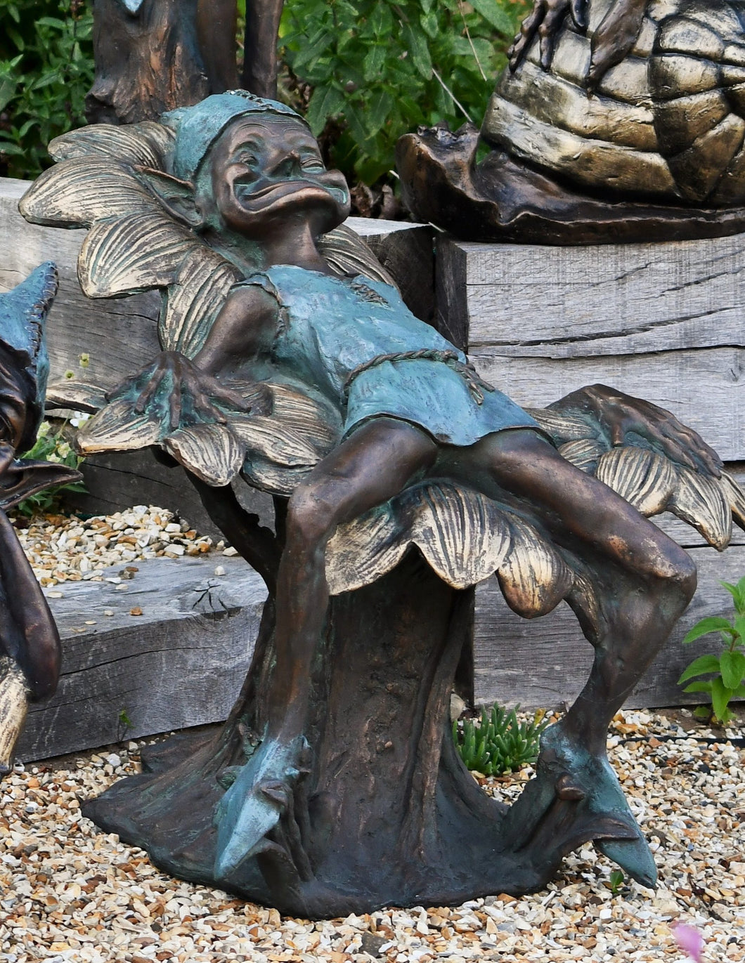 Pixie Sleeping on Flower Painted – Milestone Garden Centre